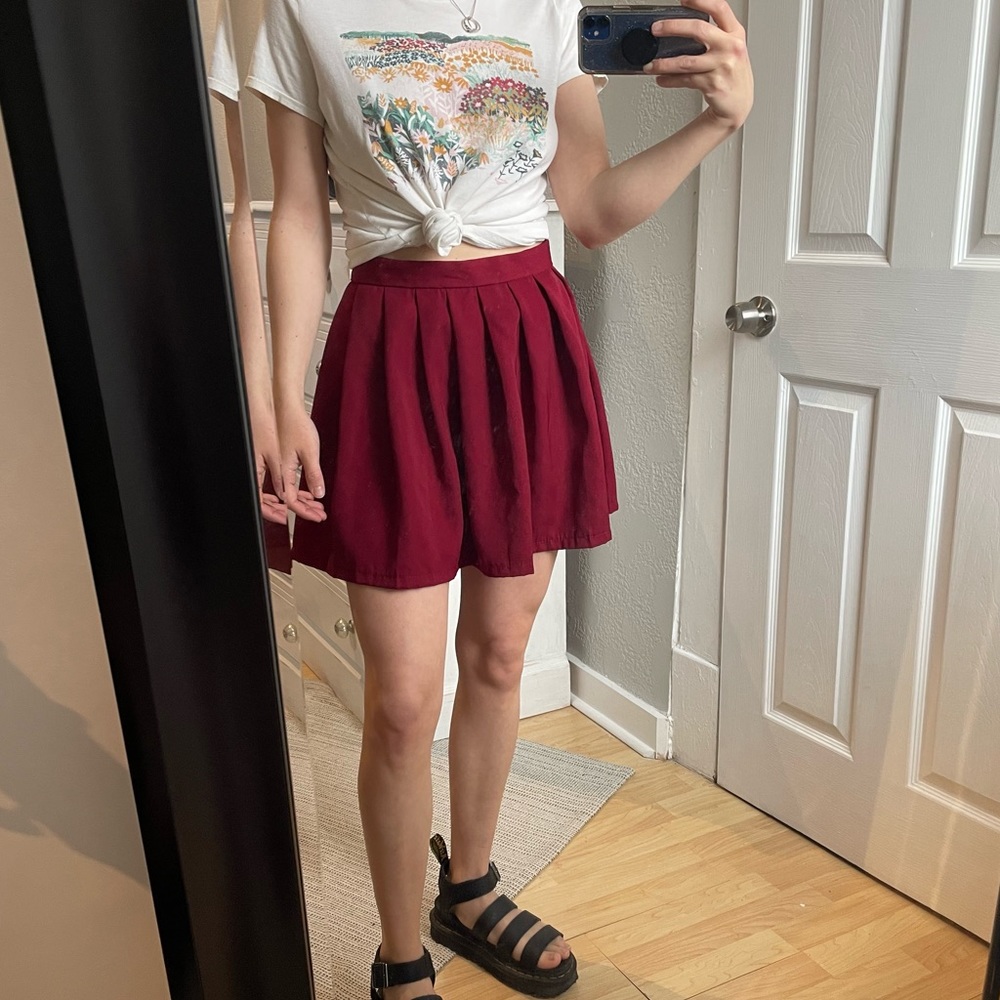 pleated red mini skirt